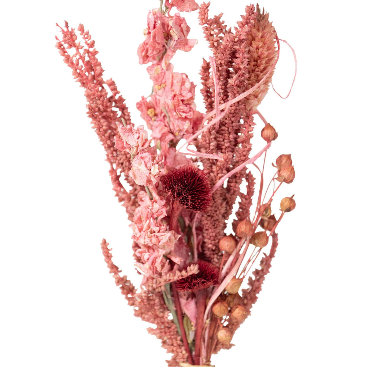 The Pink Wildflower Mini Bouquet by Andaluca features dried flowers in pink and red shades, textured grasses, delicate petals, and rounded seed pods for a decorative accent.