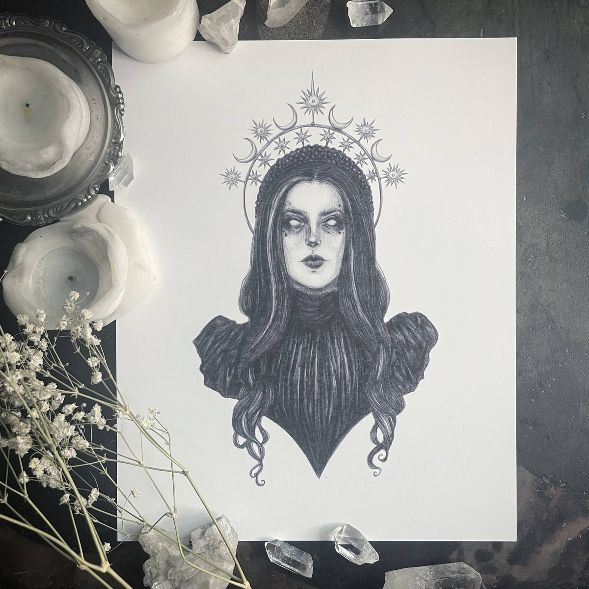 The Nyx Fine Art Print by Caitlin McCarthy Art (10 x 8) features a black and white illustration of a long-haired woman inspired by the Greek Goddess of Night, with a celestial halo, printed on archival matte paper.
