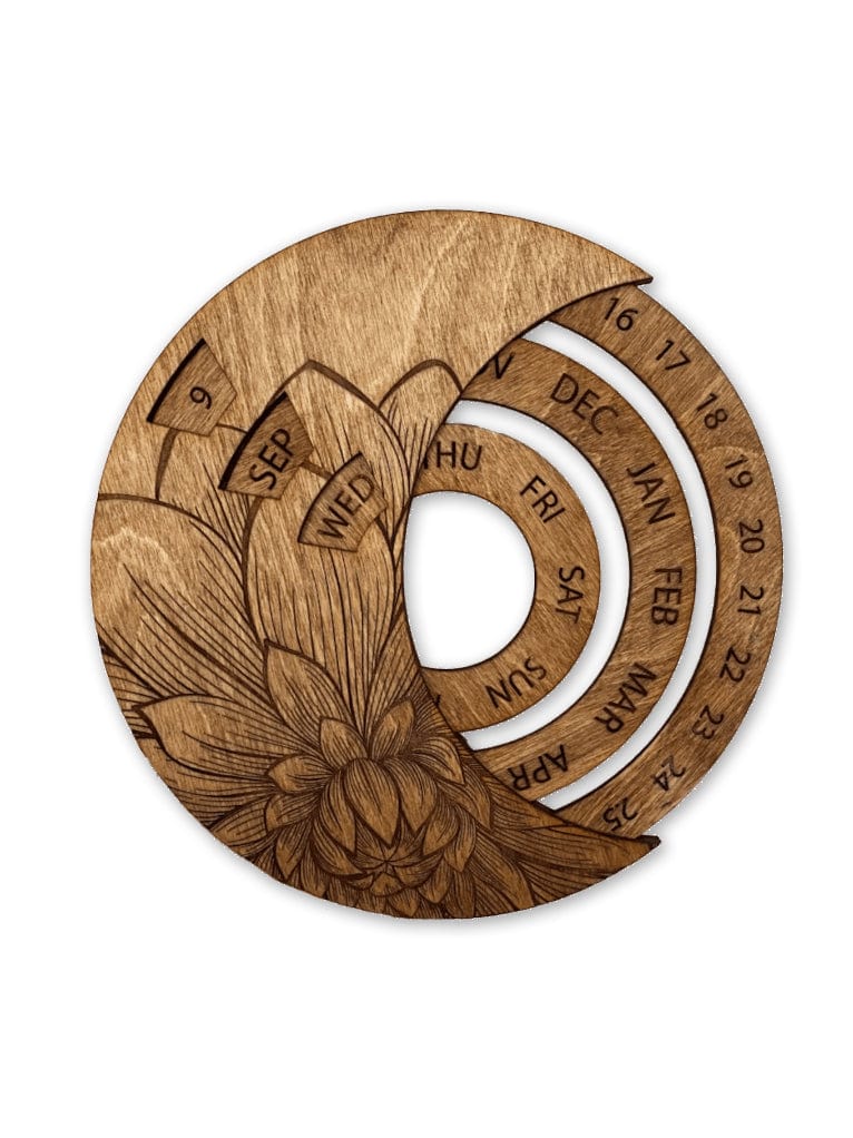 The CSAcreative Perpetual Calendar is a handcrafted wooden circular calendar with floral engraving, featuring rotating rings and engraved abbreviations to display the day, date, and month.