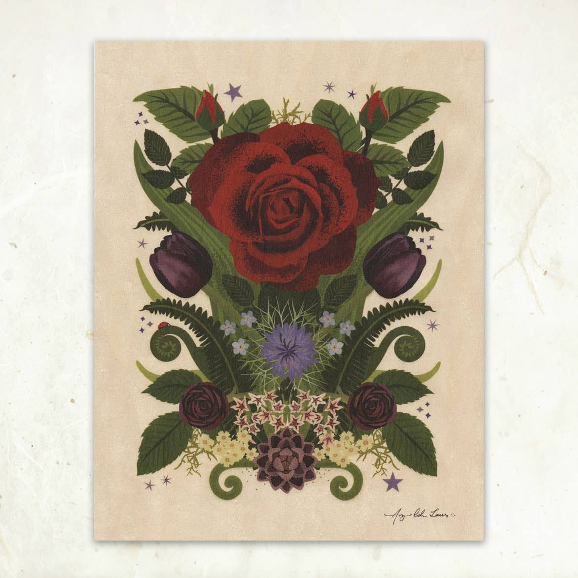 Rose & Ladybug Small Wood Print (11 x 8.5) by Little Gold Fox Designs features a central red rose with green leaves, purple flowers, dark buds, and tiny stars on light beige wood veneer. Biodegradable print option available.
