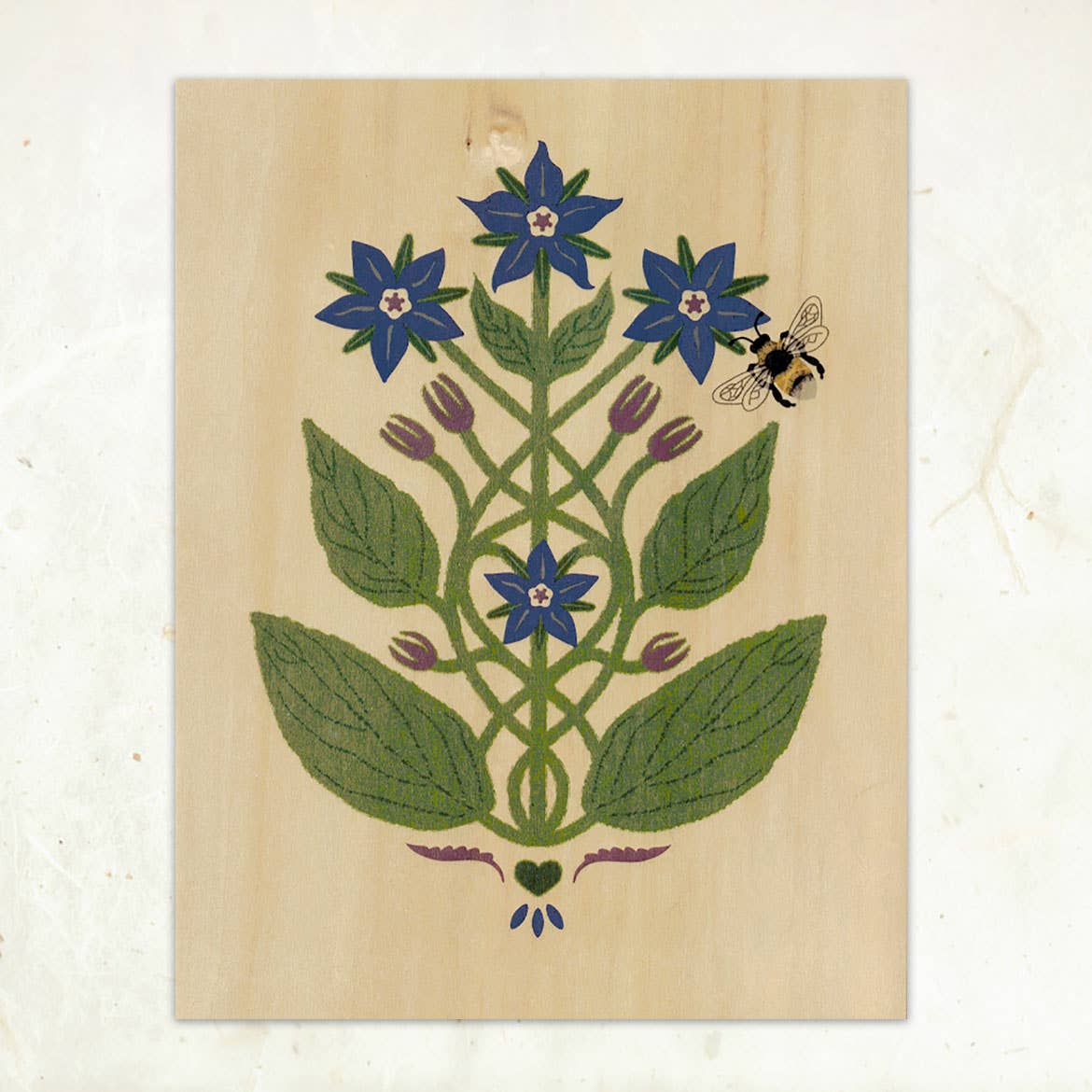 Borage and Bee Small Wood Print (11 x 8.5) by Little Gold Fox Designs features a stylized plant with five blue star-shaped flowers, green leaves, purple buds, and a bee against a light wood veneer background.