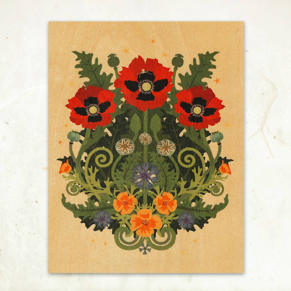 The Poppy Spider Small Wood Print (11 x 8.5) by Little Gold Fox Designs features stylized red poppies, orange flowers, and green leaves on a tan wood veneer background, crafted with sustainably-harvested materials.