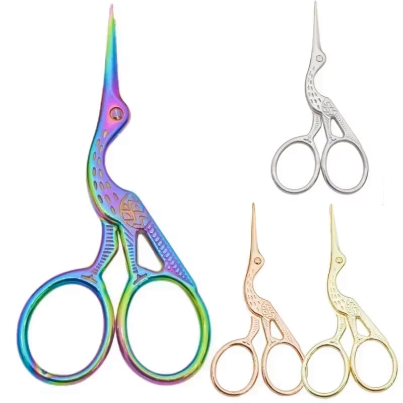 Four pairs of Persephones Hearth Embroidery Scissors (Random Color), each 3.75 and stork-shaped, in metallic rainbow, silver, rose gold, and gold hues, displayed on a white background.